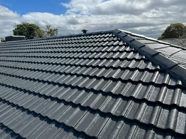 Full roof restoration on a Mornington home, with salt-damaged tiles cleaned, sealed, and ridge capping repaired for coastal protection.