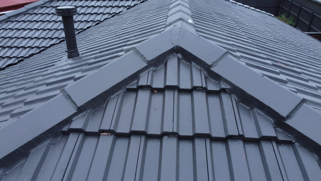 Freshly restored tile roof in Ferntree Gully with sealed ridges and clean finish.