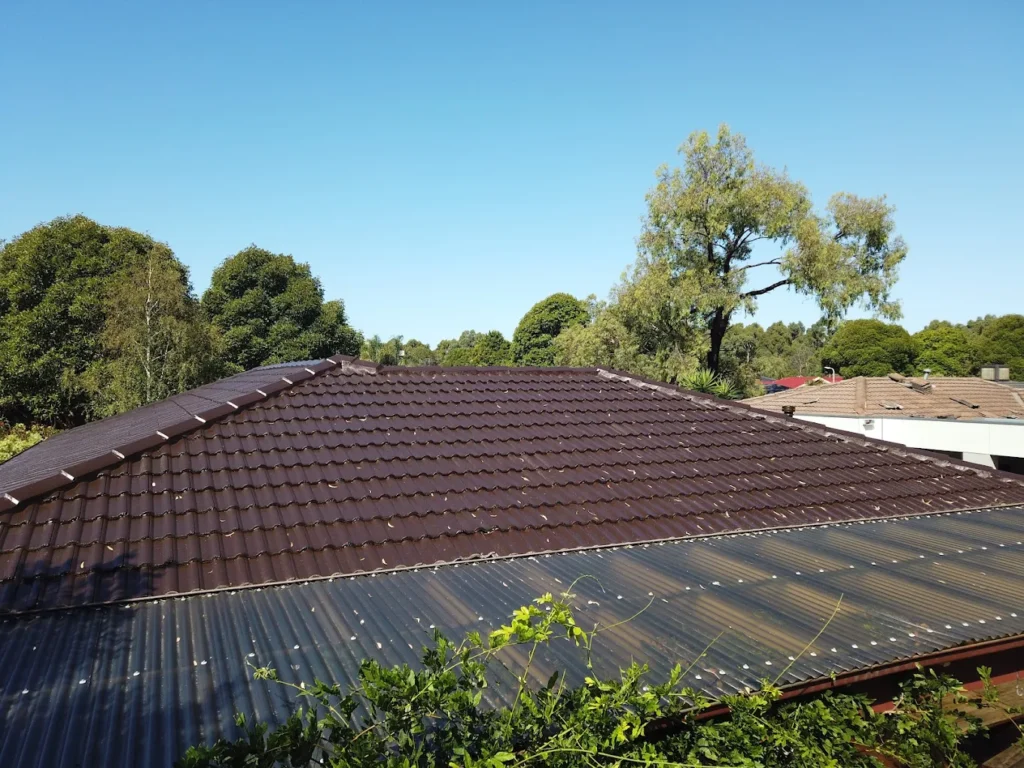Fully restored tiled roof with solar panels in Melbourne