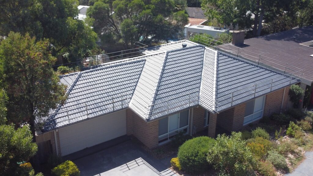 Roof repair project in Frankston focused on leak prevention and tile replacement.