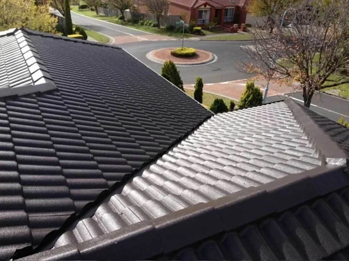 Dark tiled roof in Werribee after professional roof repair, showing clean finish and neat ridges.