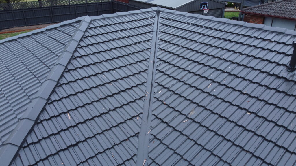 Tile roof repair in Ferntree Gully showing restored valleys and fixed tile alignment.