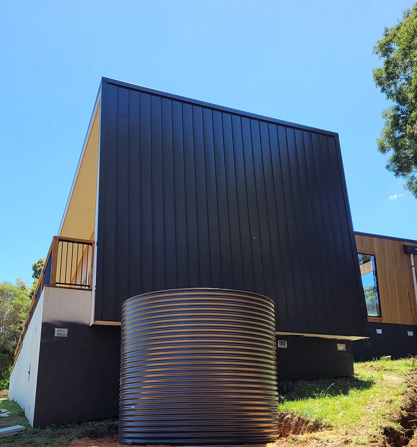 Modern house with standing seam cladding, Melbourne roofing repair and restoration.