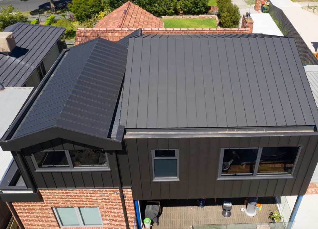 Aerial view, Melbourne roof restoration, standing seam cladding, modern house.